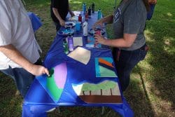 table of people doing a craft